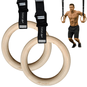 Houten turn ringen voor krachttraining en lichaamsgewichtoefeningen, inclusief banden voor ondersteuning.